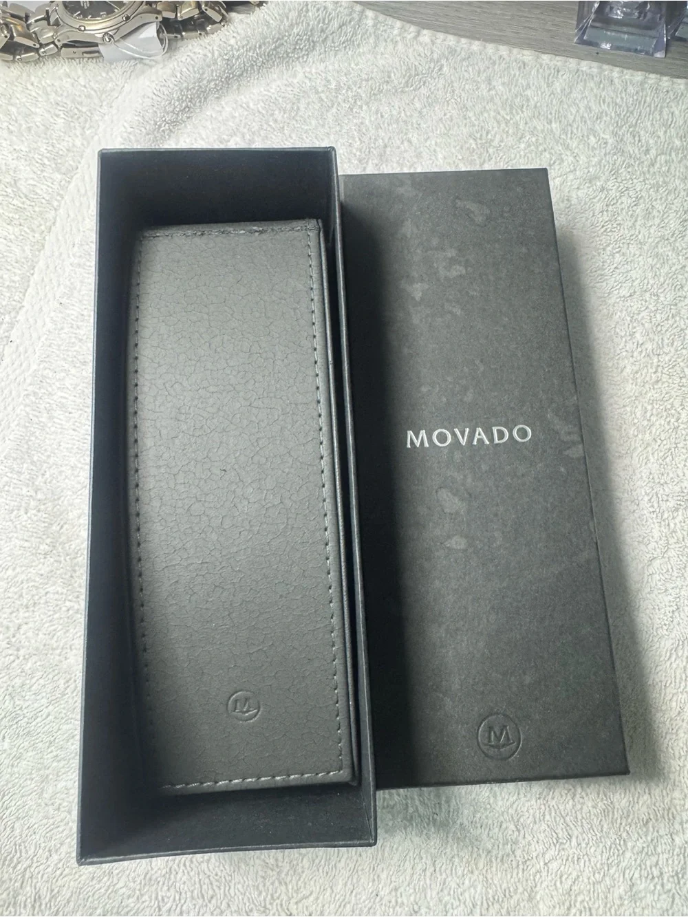#119 Movado Men's Stainless Steel Watch with Black Dial and Silver Bracelet